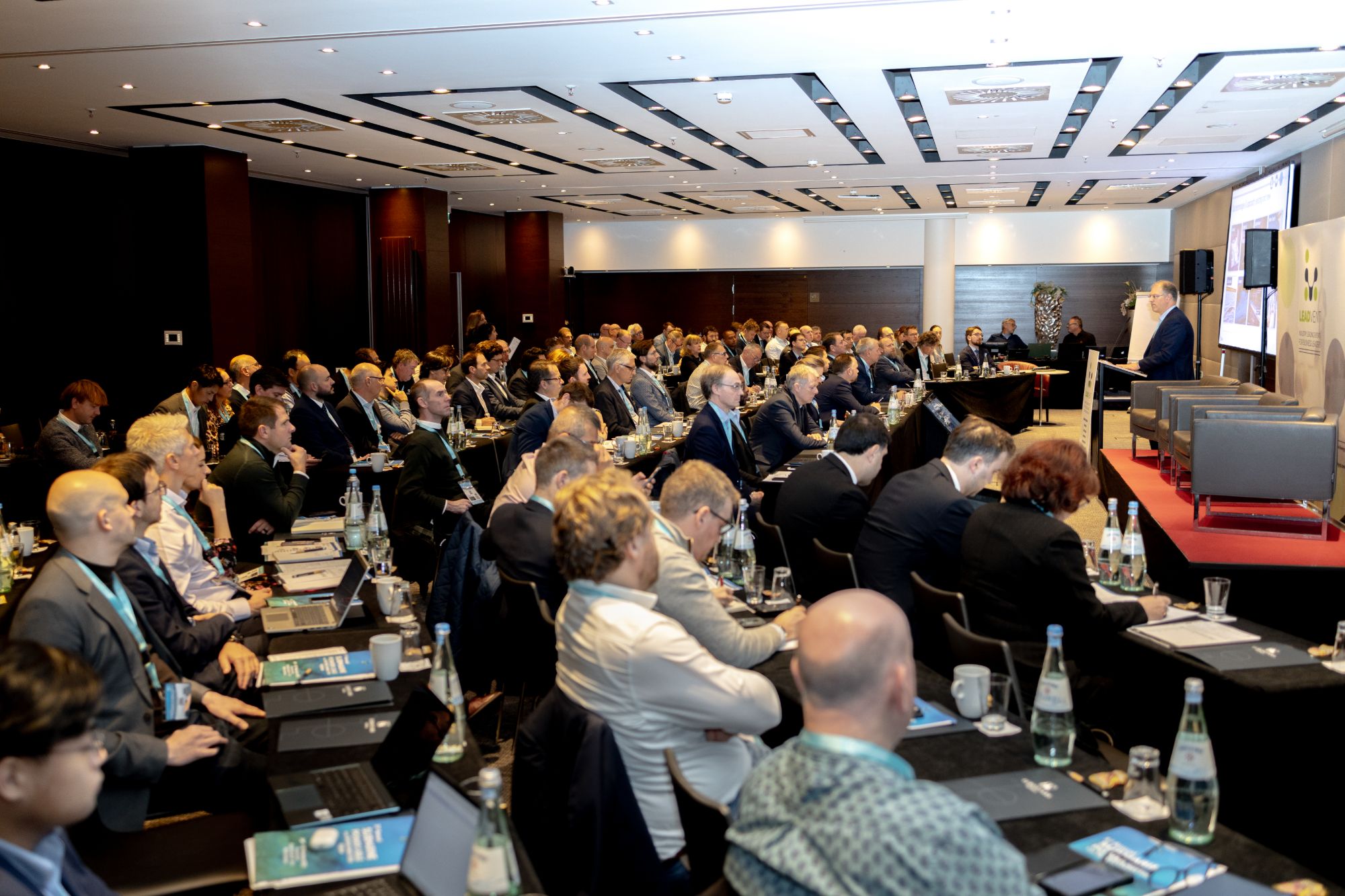 Delegates listening to a speaker at a Leadvent Group conference