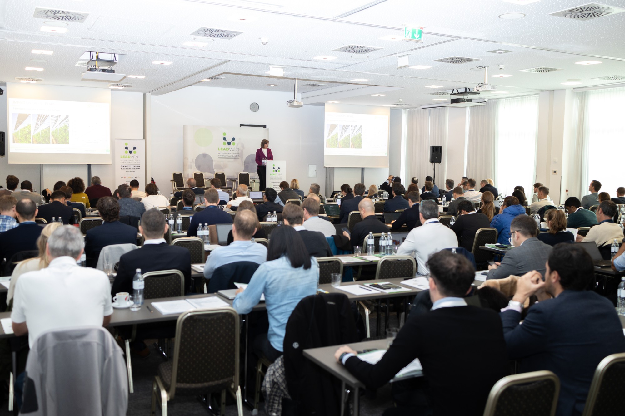 Speaker presenting to a full room at a Leadvent Group event