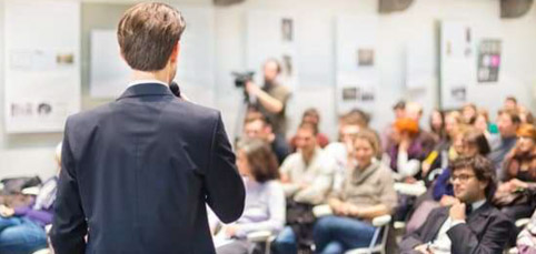 Speaker addressing delegates at a Leadvent event