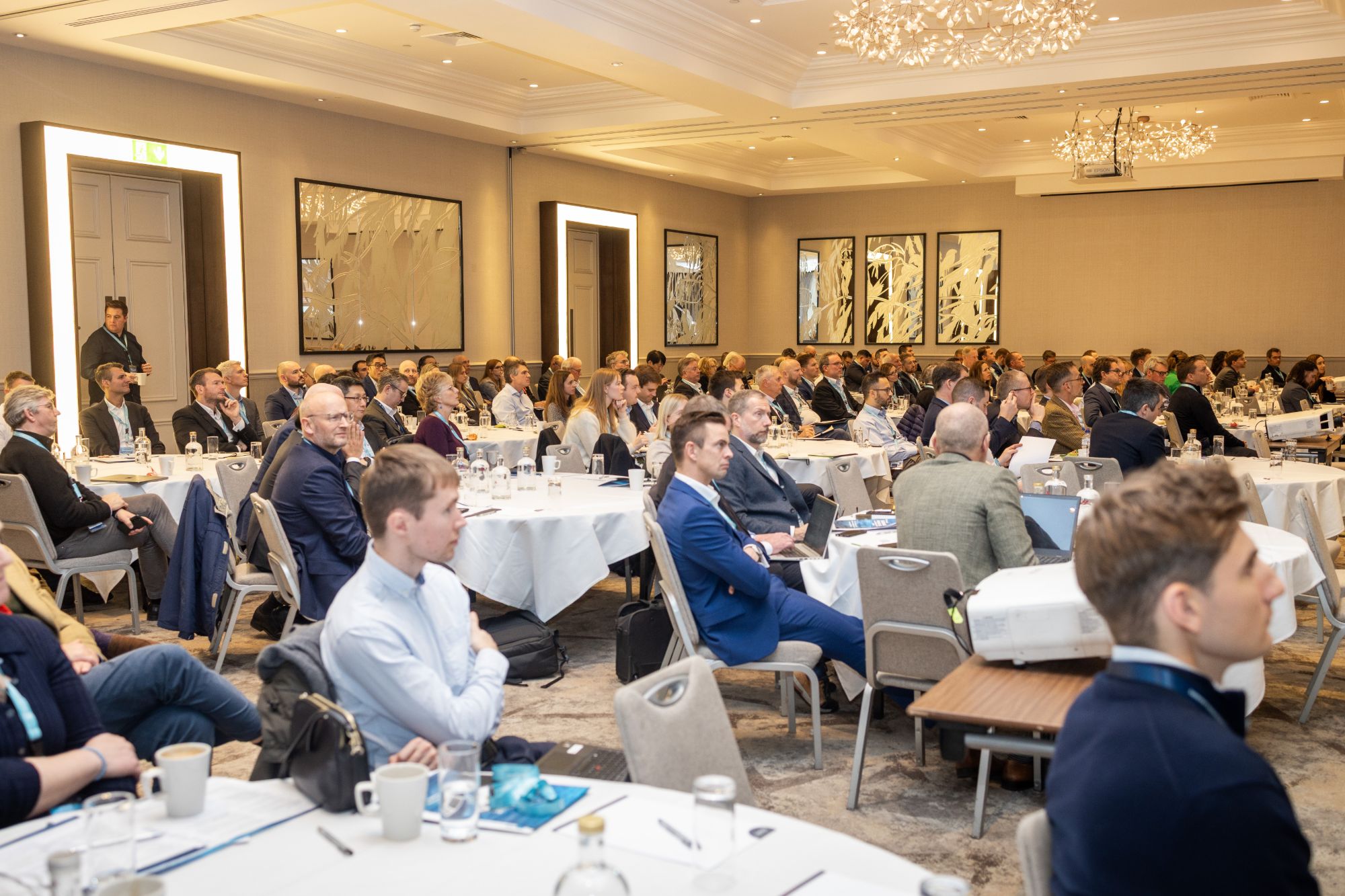 Packed conference room of delegates following a session at a Leadvent event